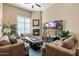 Spacious living room with fireplace and plenty of natural light at 5350 E Deer Valley E Dr # 1279, Phoenix, AZ 85054