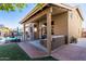 Relaxing backyard with covered patio and sparkling pool at 544 W Sierra Madre Ave, Gilbert, AZ 85233