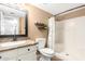 Bathroom with shower, toilet, and granite countertop at 544 W Sierra Madre Ave, Gilbert, AZ 85233