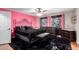 Bedroom with dark wood furniture and black accents at 544 W Sierra Madre Ave, Gilbert, AZ 85233