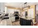 Kitchen with granite countertops and white cabinets at 544 W Sierra Madre Ave, Gilbert, AZ 85233