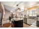 Updated kitchen featuring granite countertops and an island at 544 W Sierra Madre Ave, Gilbert, AZ 85233