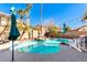 Inviting kidney-shaped pool with lounge chairs at 544 W Sierra Madre Ave, Gilbert, AZ 85233