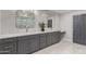 Primary bathroom with double vanity and marble countertops at 6328 N 126Th Ave, Litchfield Park, AZ 85340