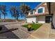 Artificial turf front yard with walkway and landscaping at 6328 N 126Th Ave, Litchfield Park, AZ 85340