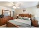 Bright bedroom featuring a wooden bed frame and dresser at 6437 E Cypress St, Scottsdale, AZ 85257