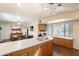 Kitchen with an island, gas cooktop, and ample counter space at 6437 E Cypress St, Scottsdale, AZ 85257