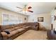 Living room with sectional sofa and plantation shutters at 6437 E Cypress St, Scottsdale, AZ 85257