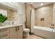 Clean bathroom with tub, shower, and light wood vanity at 7120 E Kierland Blvd # 311, Scottsdale, AZ 85254