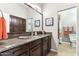 Bathroom with granite vanity and bathtub at 7126 E Bobwhite Way, Scottsdale, AZ 85266