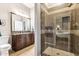 Bathroom with walk-in shower and granite vanity at 7126 E Bobwhite Way, Scottsdale, AZ 85266