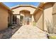 Elegant entryway with a tile floor and a wood door at 7126 E Bobwhite Way, Scottsdale, AZ 85266