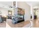 Elegant stone fireplace as a focal point of the living room at 7126 E Bobwhite Way, Scottsdale, AZ 85266