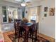 Charming dining area with built-in hutch and hardwood floors at 7300 N 51St Ave # F91, Glendale, AZ 85301