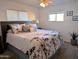 Large main bedroom with a plush bed and ample closet space at 7300 N 51St Ave # F91, Glendale, AZ 85301