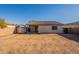 Large backyard with storage shed at 7334 S Morning Dew Ln, Buckeye, AZ 85326