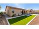 Artificial turf, covered patio, and side yard at 7432 E Melrose St, Mesa, AZ 85207