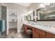 Elegant bathroom with double vanity, large mirror, and shower at 7432 E Melrose St, Mesa, AZ 85207