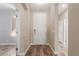 Bright entryway with wood-look tile and white door at 7432 E Melrose St, Mesa, AZ 85207