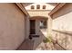 Front entry with arched doorways and terracotta flooring at 7432 E Melrose St, Mesa, AZ 85207