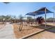 Community playground with swings and playset at 7432 E Melrose St, Mesa, AZ 85207