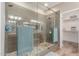 Walk-in shower with glass enclosure and pebble floor at 7432 E Melrose St, Mesa, AZ 85207