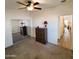 A carpeted bedroom has a chest of drawers and mirrored closet doors at 7807 E Main St # F36, Mesa, AZ 85207