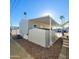 Exterior view showing the side of the home with desert landscaping at 7807 E Main St # F36, Mesa, AZ 85207