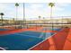 A red and blue outdoor pickleball court ready for a competitive match at 7807 E Main St # F36, Mesa, AZ 85207