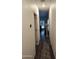 Bright hallway with wood-look floors and neutral walls at 7807 E Main St # Ofc, Mesa, AZ 85207