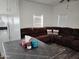 View of kitchen island and living room with sectional sofa at 7807 E Main St # Ofc, Mesa, AZ 85207