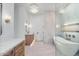 Elegant bathroom featuring a modern soaking tub, glass shower, and wood vanity at 8169 E Redberry --, Mesa, AZ 85207