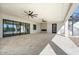 Expansive covered patio with tile flooring, ceiling fans, and spiral staircase enhances outdoor living at 8169 E Redberry --, Mesa, AZ 85207