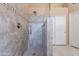 Walk-in shower with built-in seat and glass enclosure at 8732 W Rockwood Dr, Peoria, AZ 85382