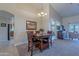 Dining room features a wood table and chandelier at 8732 W Rockwood Dr, Peoria, AZ 85382