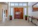 Bright entryway with wood floors and double doors at 8732 W Rockwood Dr, Peoria, AZ 85382