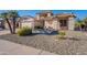 Single-story home with desert landscaping and two-car garage at 8732 W Rockwood Dr, Peoria, AZ 85382