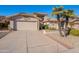 Two-car garage and desert landscaping at 8732 W Rockwood Dr, Peoria, AZ 85382