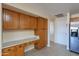 Kitchen features built-in desk and pantry at 8732 W Rockwood Dr, Peoria, AZ 85382