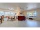 Living room with cozy seating and a fireplace at 8732 W Rockwood Dr, Peoria, AZ 85382