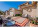 Relaxing patio with outdoor seating and colorful rug at 8732 W Rockwood Dr, Peoria, AZ 85382