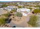 Aerial view of house and surrounding desert landscape at 922 E Desert Hills Estate Dr, Phoenix, AZ 85086