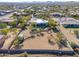 Aerial view of house, landscape and distant mountains at 922 E Desert Hills Estate Dr, Phoenix, AZ 85086