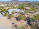 Aerial view of house, landscaping and mountains at 922 E Desert Hills Estate Dr, Phoenix, AZ 85086