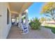 Relaxing covered patio with rocking chairs, offering a peaceful outdoor space at 922 E Desert Hills Estate Dr, Phoenix, AZ 85086