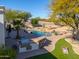 Relaxing backyard with a built-in BBQ, pool, and plenty of space for outdoor enjoyment at 922 E Desert Hills Estate Dr, Phoenix, AZ 85086