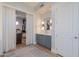 Bathroom with a vanity, walk-in closet, and modern fixtures at 922 E Desert Hills Estate Dr, Phoenix, AZ 85086