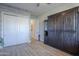 Spacious bedroom with a built-in murphy bed and closet at 922 E Desert Hills Estate Dr, Phoenix, AZ 85086