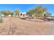 Long gravel driveway leading to a beautiful desert home at 922 E Desert Hills Estate Dr, Phoenix, AZ 85086