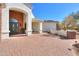 Elegant entryway with brick accents and a spacious patio at 922 E Desert Hills Estate Dr, Phoenix, AZ 85086